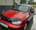 Красный Дэу Ланос, объемом двигателя 1.5 л и пробегом 220 тыс. км за 2200 $, фото 1 на Automoto.ua