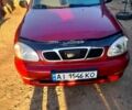 Красный Дэу Ланос, объемом двигателя 1.5 л и пробегом 200 тыс. км за 2500 $, фото 1 на Automoto.ua