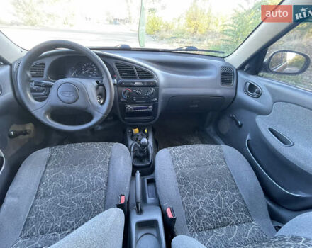 Красный Дэу Ланос, объемом двигателя 1.5 л и пробегом 200 тыс. км за 2150 $, фото 12 на Automoto.ua