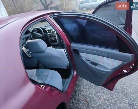 Красный Дэу Ланос, объемом двигателя 1.6 л и пробегом 244 тыс. км за 2850 $, фото 5 на Automoto.ua