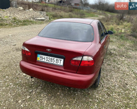 Красный Дэу Ланос, объемом двигателя 1.5 л и пробегом 220 тыс. км за 1350 $, фото 2 на Automoto.ua