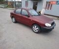 Червоний Деу Ланос, об'ємом двигуна 1.5 л та пробігом 250 тис. км за 1350 $, фото 1 на Automoto.ua