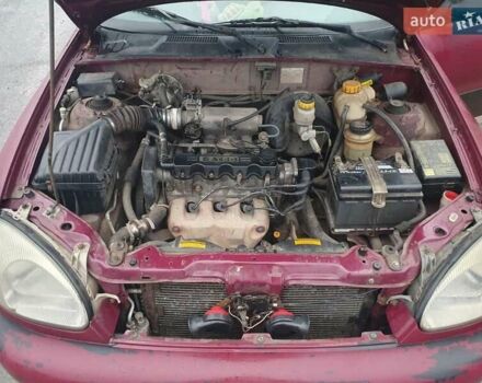 Красный Дэу Ланос, объемом двигателя 1.5 л и пробегом 226 тыс. км за 2400 $, фото 10 на Automoto.ua