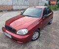 Красный Дэу Ланос, объемом двигателя 1.5 л и пробегом 220 тыс. км за 1999 $, фото 1 на Automoto.ua