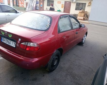 Красный Дэу Ланос, объемом двигателя 1.5 л и пробегом 175 тыс. км за 1000 $, фото 4 на Automoto.ua