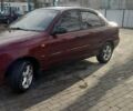 Красный Дэу Ланос, объемом двигателя 1.6 л и пробегом 200 тыс. км за 2400 $, фото 2 на Automoto.ua