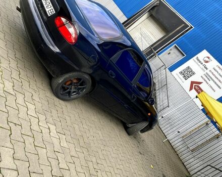 Красный Дэу Ланос, объемом двигателя 1.5 л и пробегом 116 тыс. км за 3500 $, фото 2 на Automoto.ua