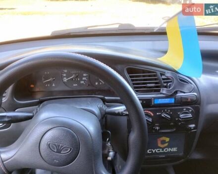 Красный Дэу Ланос, объемом двигателя 1.5 л и пробегом 322 тыс. км за 2200 $, фото 5 на Automoto.ua