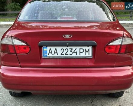 Красный Дэу Ланос, объемом двигателя 1.5 л и пробегом 265 тыс. км за 2300 $, фото 2 на Automoto.ua