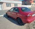 Красный Дэу Ланос, объемом двигателя 1.5 л и пробегом 321 тыс. км за 3200 $, фото 2 на Automoto.ua