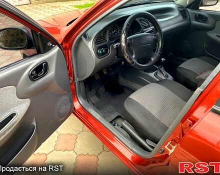 Красный Дэу Ланос, объемом двигателя 1.5 л и пробегом 190 тыс. км за 2650 $, фото 4 на Automoto.ua