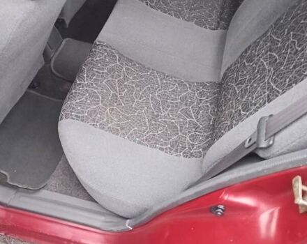 Червоний Деу Ланос, об'ємом двигуна 1.3 л та пробігом 220 тис. км за 1850 $, фото 27 на Automoto.ua