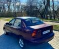 Красный Дэу Ланос, объемом двигателя 1.5 л и пробегом 310 тыс. км за 1950 $, фото 6 на Automoto.ua