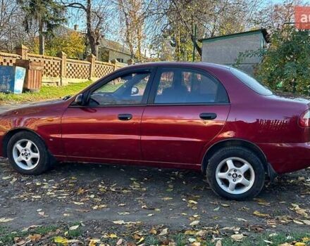 Красный Дэу Ланос, объемом двигателя 1.6 л и пробегом 216 тыс. км за 1900 $, фото 4 на Automoto.ua