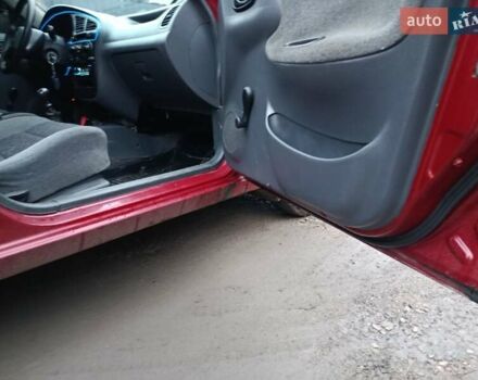 Красный Дэу Ланос, объемом двигателя 1.3 л и пробегом 270 тыс. км за 1500 $, фото 2 на Automoto.ua