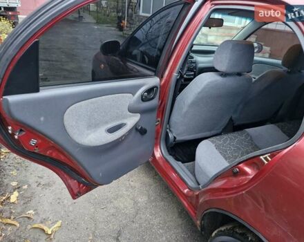 Красный Дэу Ланос, объемом двигателя 1.6 л и пробегом 163 тыс. км за 2650 $, фото 11 на Automoto.ua