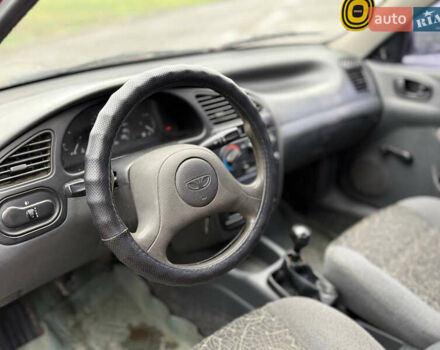 Красный Дэу Ланос, объемом двигателя 1.5 л и пробегом 224 тыс. км за 1750 $, фото 7 на Automoto.ua