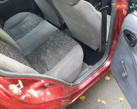 Красный Дэу Ланос, объемом двигателя 1.5 л и пробегом 270 тыс. км за 2450 $, фото 9 на Automoto.ua