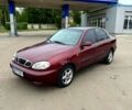 Красный Дэу Ланос, объемом двигателя 1.5 л и пробегом 310 тыс. км за 1950 $, фото 1 на Automoto.ua