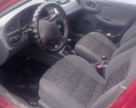 Красный Дэу Ланос, объемом двигателя 1.5 л и пробегом 260 тыс. км за 1499 $, фото 4 на Automoto.ua