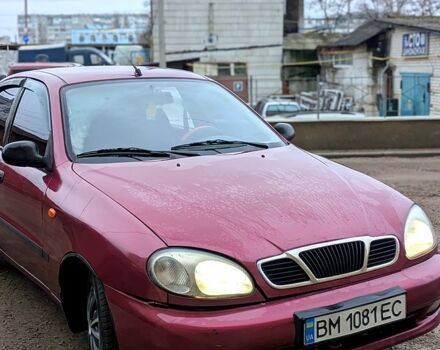 Червоний Деу Ланос, об'ємом двигуна 1.5 л та пробігом 313 тис. км за 2400 $, фото 1 на Automoto.ua