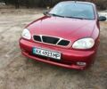 Красный Дэу Ланос, объемом двигателя 1.5 л и пробегом 256 тыс. км за 2900 $, фото 1 на Automoto.ua