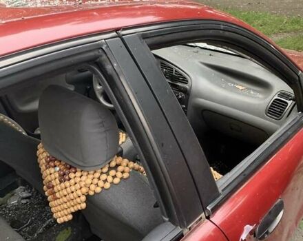 Красный Дэу Ланос, объемом двигателя 1.5 л и пробегом 120 тыс. км за 1600 $, фото 4 на Automoto.ua