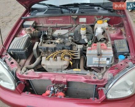 Красный Дэу Ланос, объемом двигателя 1.5 л и пробегом 191 тыс. км за 2500 $, фото 5 на Automoto.ua