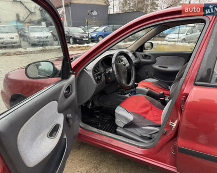 Красный Дэу Ланос, объемом двигателя 1.5 л и пробегом 310 тыс. км за 1850 $, фото 6 на Automoto.ua