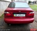 Красный Дэу Ланос, объемом двигателя 1.5 л и пробегом 191 тыс. км за 2300 $, фото 1 на Automoto.ua