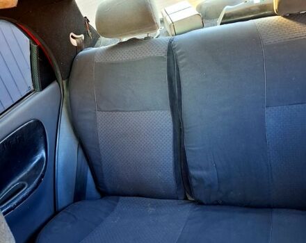 Деу Ланос 2006 у Смеле на Automoto.ua Червоний Деу Ланос, об'ємом двигуна 1.5 л та пробігом 316 тис. км за 1000 $, фото 11 на Automoto.ua