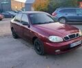 Красный Дэу Ланос, объемом двигателя 1.5 л и пробегом 233 тыс. км за 2100 $, фото 1 на Automoto.ua
