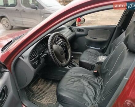 Красный Дэу Ланос, объемом двигателя 1.5 л и пробегом 224 тыс. км за 2700 $, фото 3 на Automoto.ua
