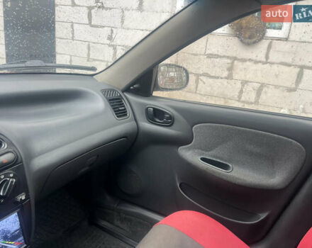 Красный Дэу Ланос, объемом двигателя 1.5 л и пробегом 183 тыс. км за 3000 $, фото 11 на Automoto.ua