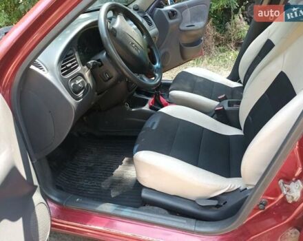 Красный Дэу Ланос, объемом двигателя 1.6 л и пробегом 304 тыс. км за 2900 $, фото 6 на Automoto.ua