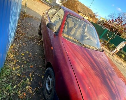 Червоний Деу Ланос, об'ємом двигуна 1.5 л та пробігом 126 тис. км за 1000 $, фото 2 на Automoto.ua