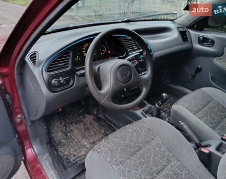 Красный Дэу Ланос, объемом двигателя 1.3 л и пробегом 270 тыс. км за 1500 $, фото 9 на Automoto.ua