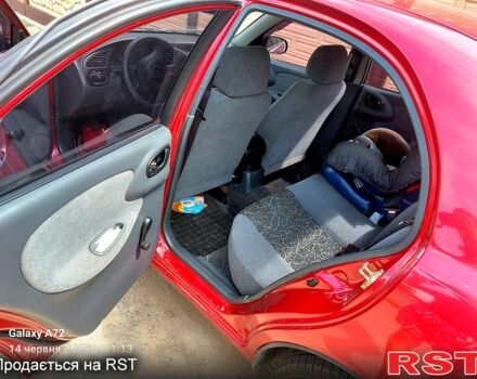 Красный Дэу Ланос, объемом двигателя 1.5 л и пробегом 87 тыс. км за 2900 $, фото 3 на Automoto.ua