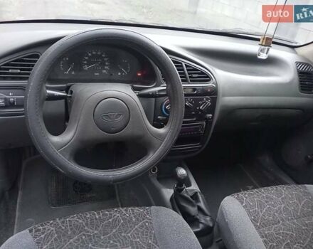 Червоний Деу Ланос, об'ємом двигуна 1.3 л та пробігом 220 тис. км за 1850 $, фото 30 на Automoto.ua