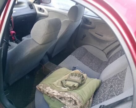 Красный Дэу Ланос, объемом двигателя 1.5 л и пробегом 175 тыс. км за 1000 $, фото 6 на Automoto.ua