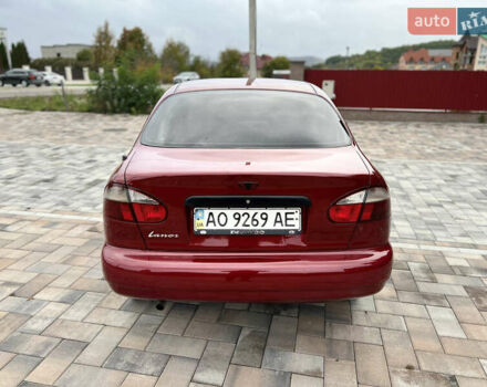 Красный Дэу Ланос, объемом двигателя 1.5 л и пробегом 250 тыс. км за 1950 $, фото 25 на Automoto.ua