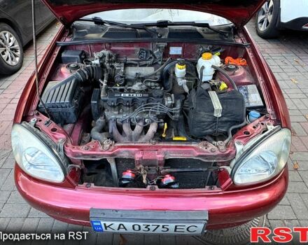 Красный Дэу Ланос, объемом двигателя 1.5 л и пробегом 290 тыс. км за 1950 $, фото 10 на Automoto.ua