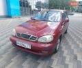 Красный Дэу Ланос, объемом двигателя 1.5 л и пробегом 300 тыс. км за 1400 $, фото 1 на Automoto.ua