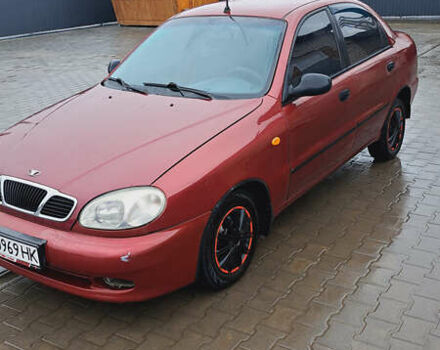 Красный Дэу Ланос, объемом двигателя 1.5 л и пробегом 153 тыс. км за 2000 $, фото 1 на Automoto.ua