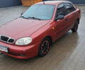 Красный Дэу Ланос, объемом двигателя 1.5 л и пробегом 153 тыс. км за 2000 $, фото 1 на Automoto.ua