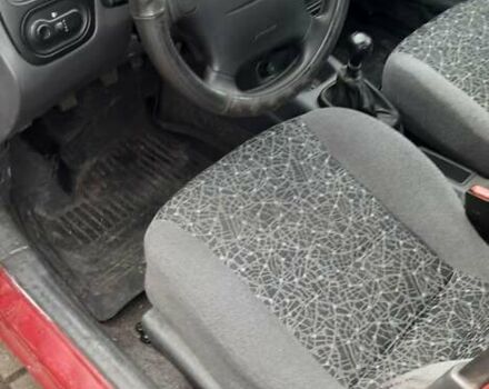 Червоний Деу Ланос, об'ємом двигуна 1.5 л та пробігом 151 тис. км за 1350 $, фото 10 на Automoto.ua