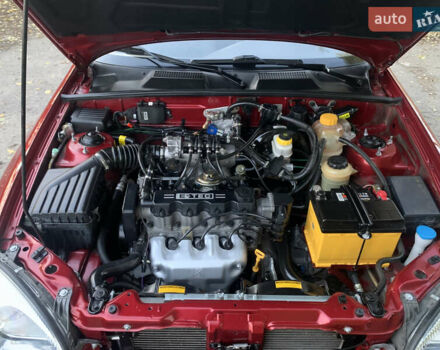 Деу Ланос 2006 у Запоріжжя на Automoto.ua Червоний Деу Ланос, об'ємом двигуна 1.5 л та пробігом 51 тис. км за 3800 $, фото 4 на Automoto.ua
