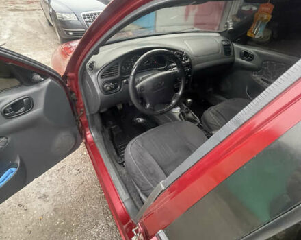 Красный Дэу Ланос, объемом двигателя 1.5 л и пробегом 399 тыс. км за 2499 $, фото 15 на Automoto.ua