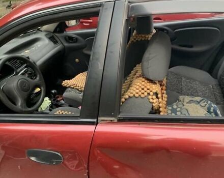 Красный Дэу Ланос, объемом двигателя 1.5 л и пробегом 120 тыс. км за 1600 $, фото 8 на Automoto.ua