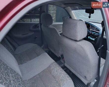 Красный Дэу Ланос, объемом двигателя 1.3 л и пробегом 270 тыс. км за 1500 $, фото 1 на Automoto.ua